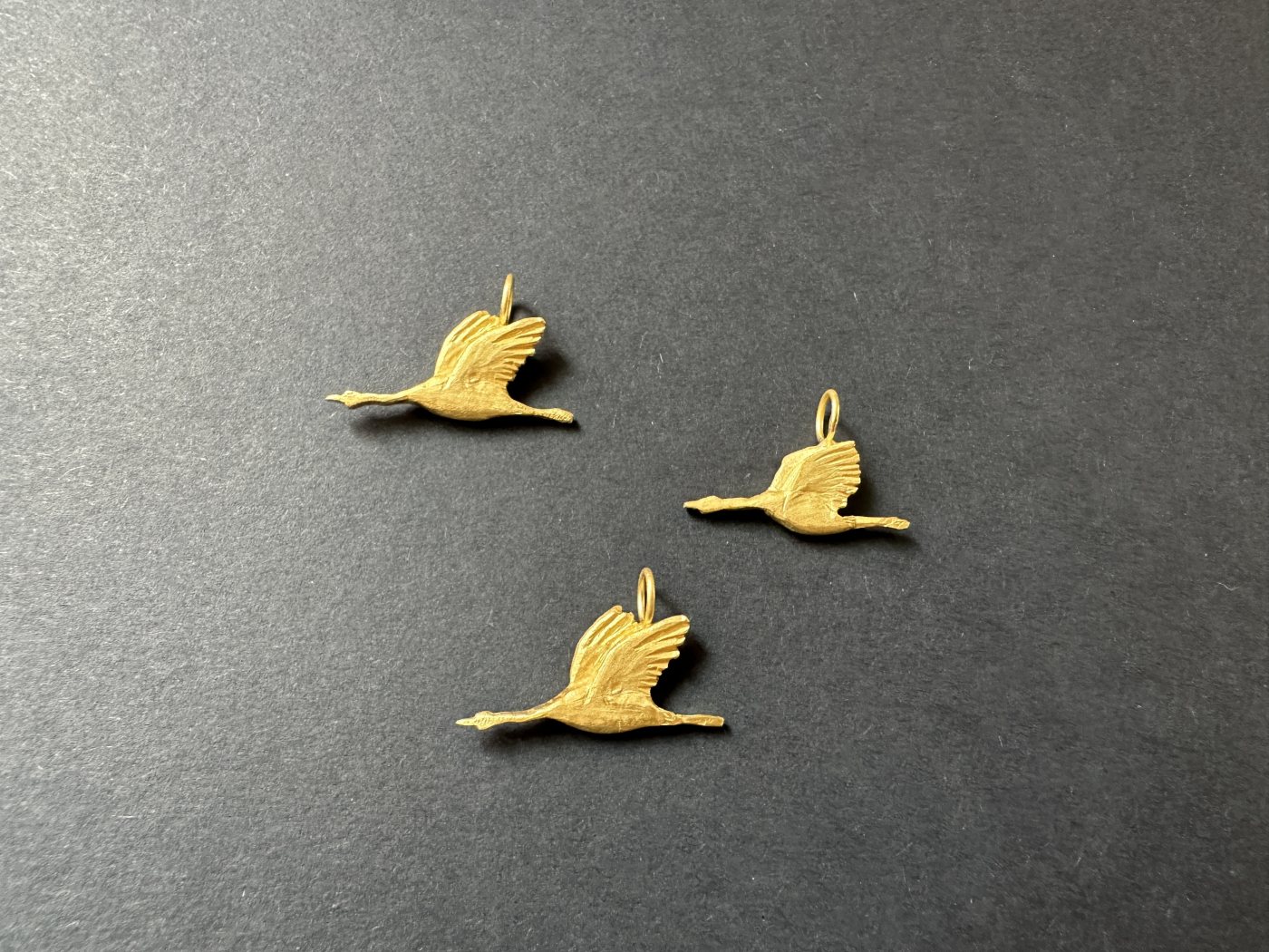 drei goldene Kraniche